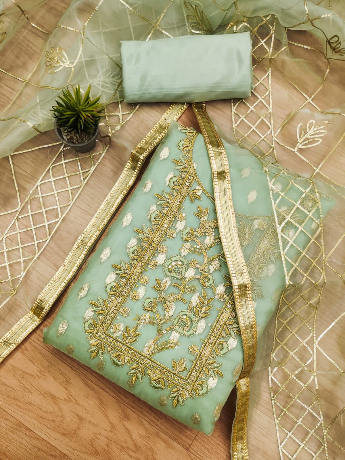 Organza Jeckard Neckwork Women Unstitched Salwar Suit Ethenika.com