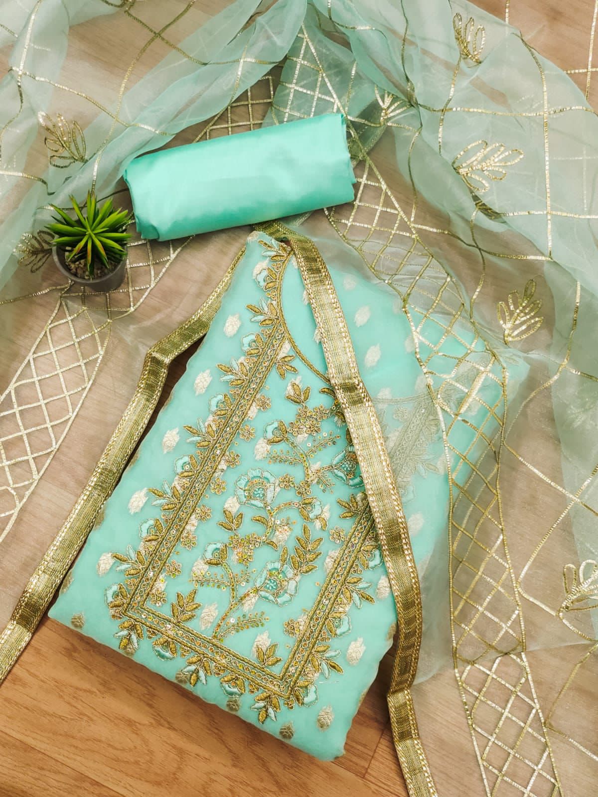 Organza Jeckard Neckwork Women Unstitched Salwar Suit Ethenika.com